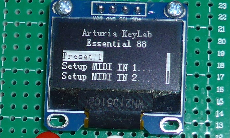 Scrollable text menu on a 128x64 SSD1306-based mono OLED